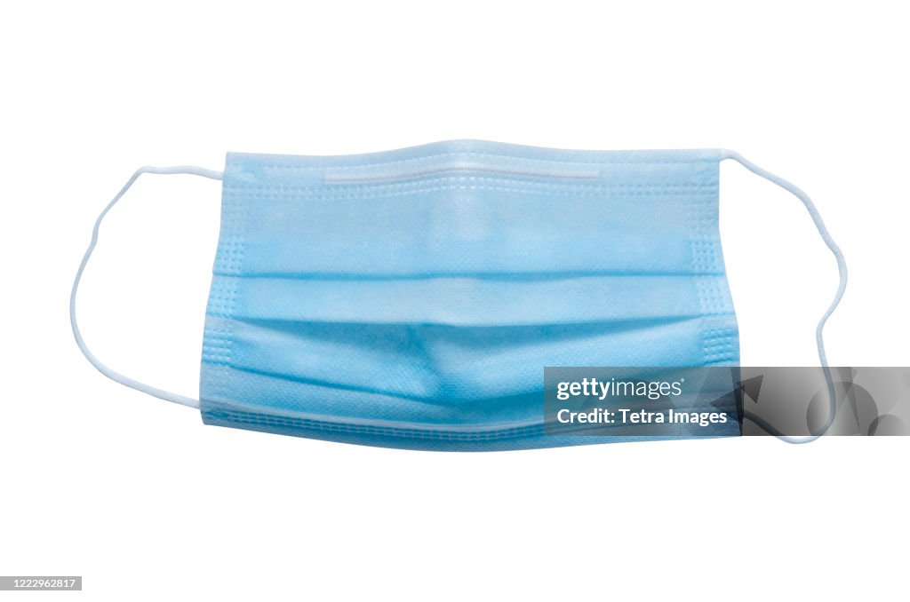 Blue medical mask on white background