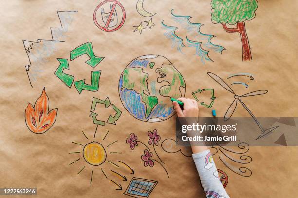 girl drawing eco friendly poster - hand drawn arrow stock-fotos und bilder