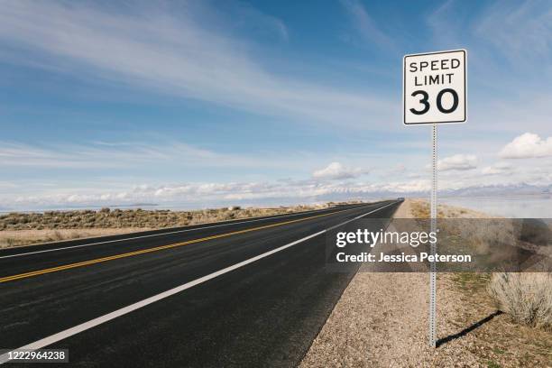usa, utah, salt lake city, empty road with speed limit sign - speed limit sign stock pictures, royalty-free photos & images