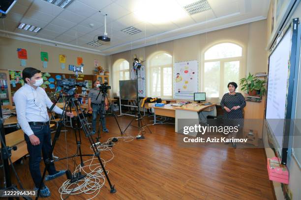 Russian teacher during an online class School-Lyceum N6 on May 5, 2020 in Baku, Azerbaijan. The Azerbaijan schools resumed classes in online format...