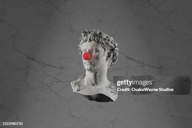 roman bust with clown nose - büste skulptur stock-fotos und bilder