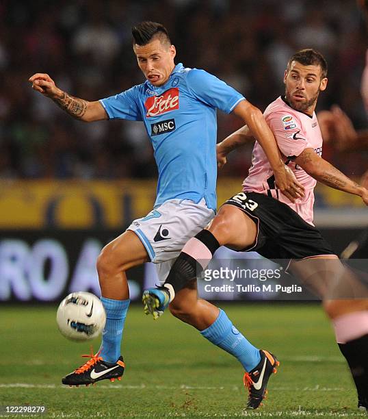 Marek Hamsik of Napoli and Antonio Nocerino of Palermo compete for the ball during the pre season friendly match between SSC Napoli and US Citta di...