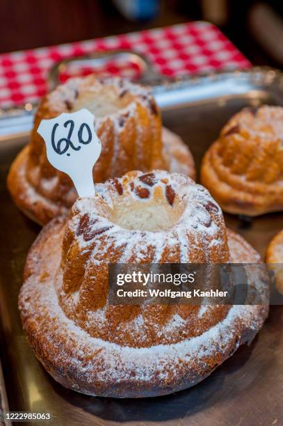 Bakery is selling freshly baked kugelhopf in the medieval town of Riquewihr, Alsace in eastern France.