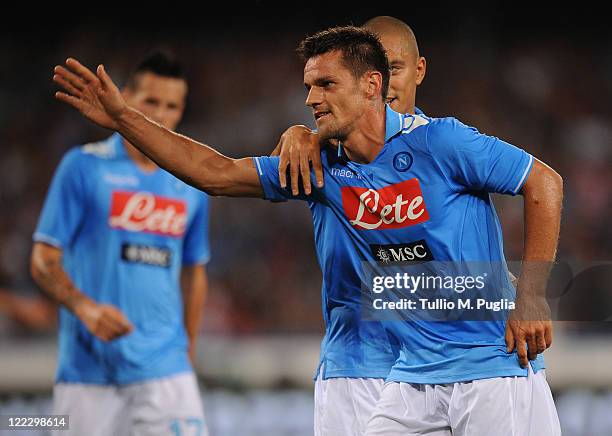 Christian Maggio of Napoli celebrates after scoring his team's second goal during the pre season friendly match between SSC Napoli and US Citta di...