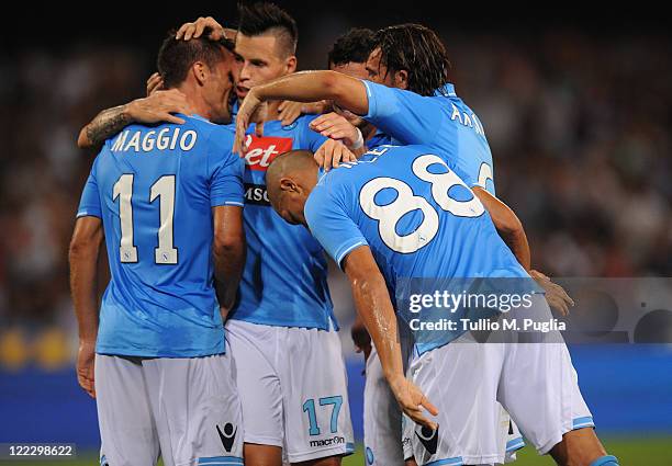 Christian Maggio of Napoli celebrates with mates after scoring his team's second goal during the pre season friendly match between SSC Napoli and US...