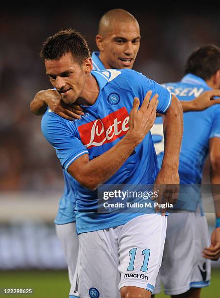 Christian Maggio of Napoli celebrates after scoring his team's second goal during the pre season friendly match between SSC Napoli and US Citta di...