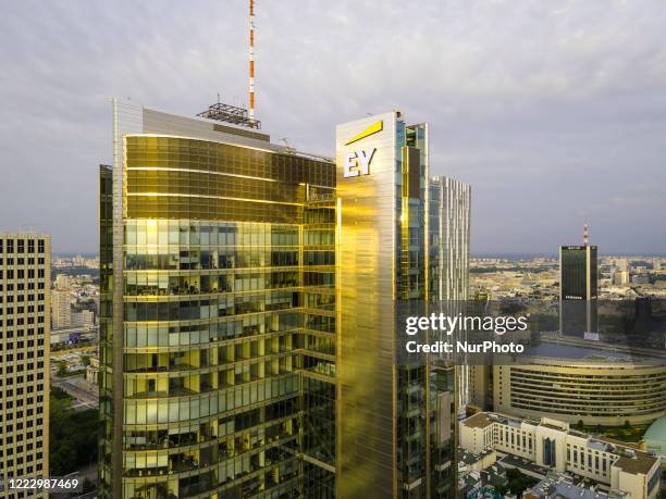 The Ernst and Young logo is seen on the Rondo 1 building on the Rondo ONZ roundabout on June 11, 2020 in Warsaw, Poland.