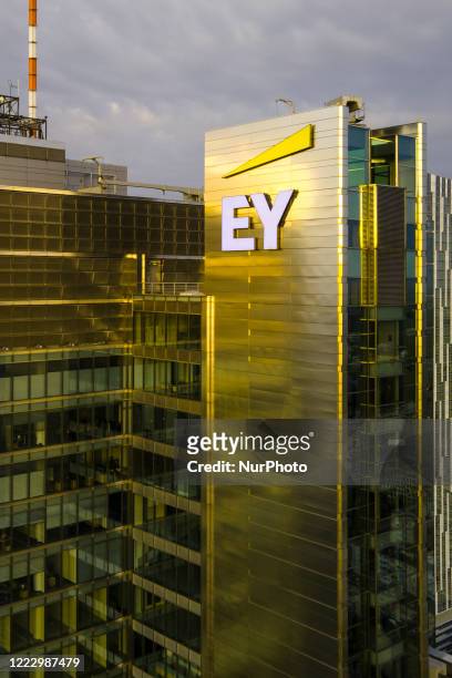 The Ernst and Young logo is seen on the Rondo 1 building on the Rondo ONZ roundabout on June 11, 2020 in Warsaw, Poland.
