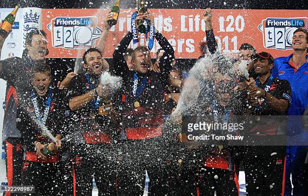 Matthew Hoggard and Paul Nixon of Leicestershire celebrate with the trophy during the Friends Life T20 Final match between Leicestershire and...