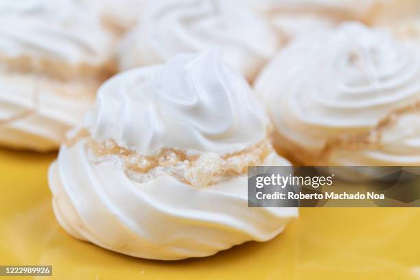 Cuban style traditional food named 'merenguitos' in English 'little meringue'. They are a sweet food made with the egg-white and sugar. Then, they...