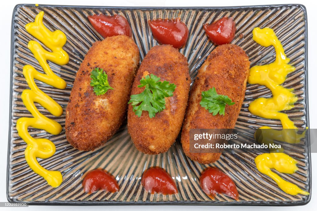 Cuban cuisine, chicken croquettes food with ketchup and...