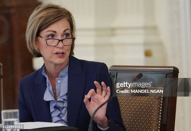 Iowa Governor Kim Reynolds speaks during an American Workforce Policy Advisory Board Meeting in the East Room of the White House in Washington, DC on...