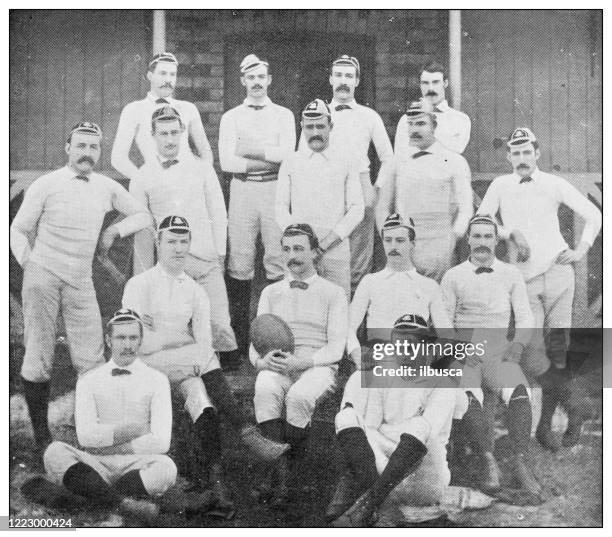 antique black and white photograph of sport, athletes and leisure activities in the 19th century 1886 - rugby union stock illustrations