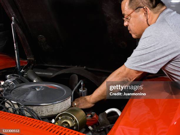 repairing a car - turbo stockfoto's en -beelden