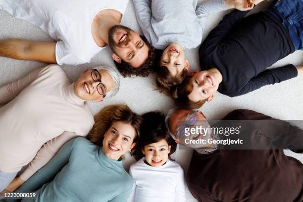 big family - children circle floor stock pictures, royalty-free photos & images