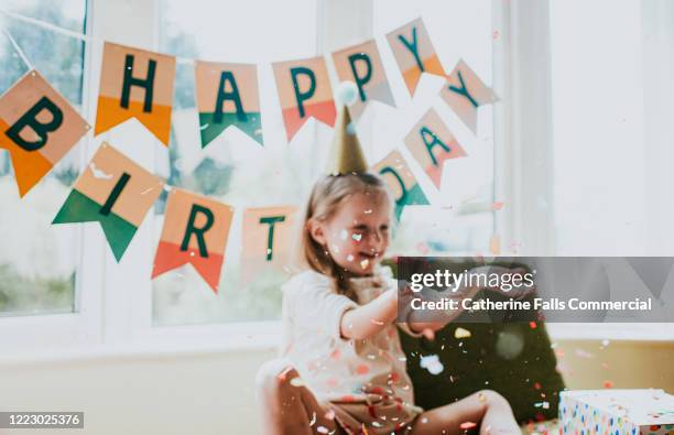soft focus birthday girl - birthday banner stock pictures, royalty-free photos & images