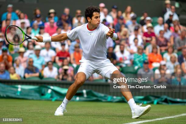 July 01: Jaume Munar of Spain in action against Kyle Edmund of Great Britain on Centre Court during the Wimbledon Lawn Tennis Championships at the...