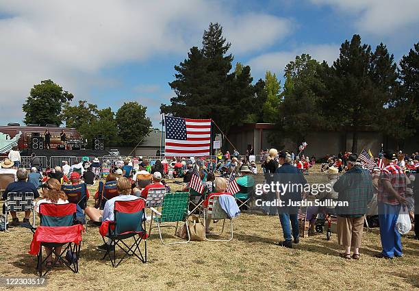 Crowd watches speakers during the Tea Party Express tour kick-off on August 27, 2011 in Napa, California. Hundreds of people were in attendance as...