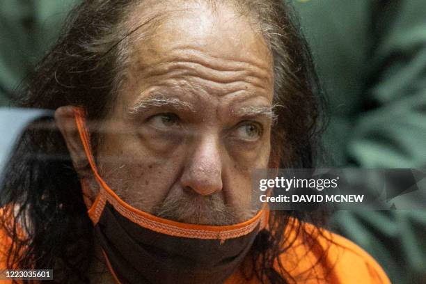 Adult film actor Ron Jeremy appears for his arraignment on rape and sexual assault charges at Clara Shortridge Foltz Criminal Justice Center on June...