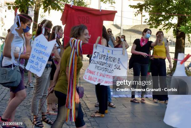 Women from the Non Una Di Meno collective return to the square after lockdown, to protest against rape and discrimination, on June 26, 2020 in Rome,...