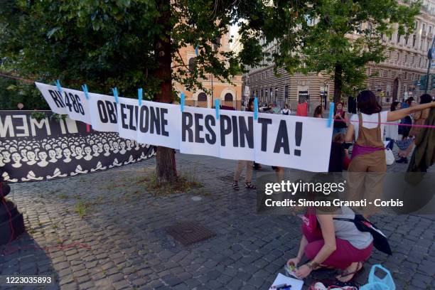 Women from the Non Una Di Meno collective return to the square after lockdown, to protest against rape and discrimination, on June 26, 2020 in Rome,...