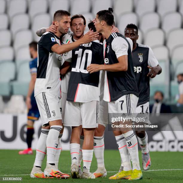 Paulo Dybala of Juventus celebrates 1-0 with Rodrigo Bentancur of Juventus, Federico Bernardeschi of Juventus, Cristiano Ronaldo of Juventus during...