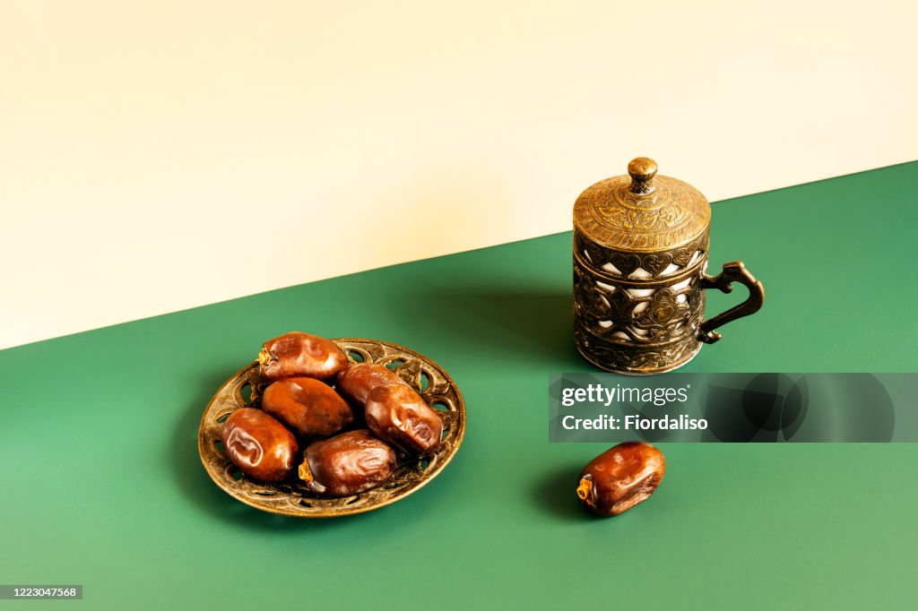 Turkish metal coffee cup with lid and saucer with dates
