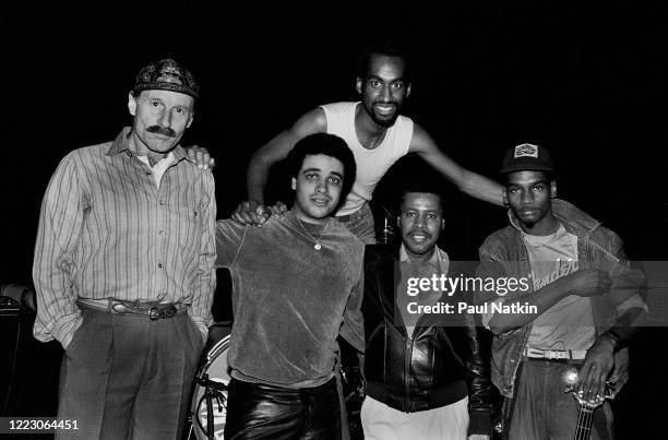 Members of the American Jazz band Weather Report pose backstage at the Park West, Chicago, Illinois, November 16, 1978. Pictured are Joe Zawinul,...
