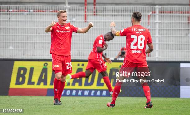 Felix Kroos and Christopher Trimmel of 1 FC. Union Berlin celebrate after scoring the 1:0 during the Bundesliga match between 1. FC Union Berlin and...