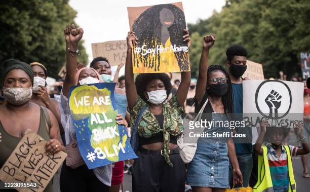People demonstrating for Black Lives Matter gather at the Victory Column in Tiergarten park on June 27, 2020 in Berlin, Germany. Hundreds of...