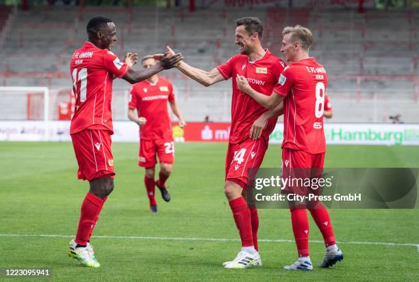 Anthony Ujah, Christian Gentner and Joshua Mees of 1 FC Union Berlin celebrate after scoring the 2:0 during the game between the 1 FC Union Berlin...