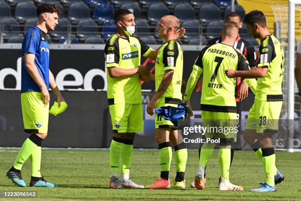 Paderborn 07 players react following the Bundesliga match between Eintracht Frankfurt and SC Paderborn 07 at Commerzbank-Arena on June 27, 2020 in...