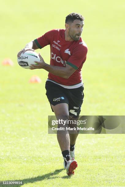 Alex Johnston of the Rabbitohs passes during a South Sydney Rabbitohs NRL training session at Redfern Oval on May 06, 2020 in Sydney, Australia.