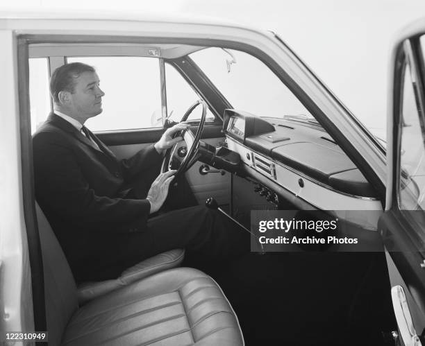 Businessman sitting in car