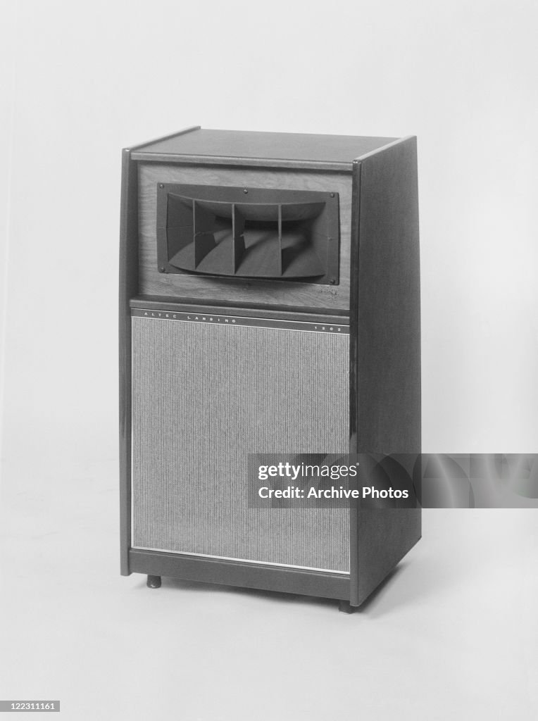 Loudspeaker against white background, close-up