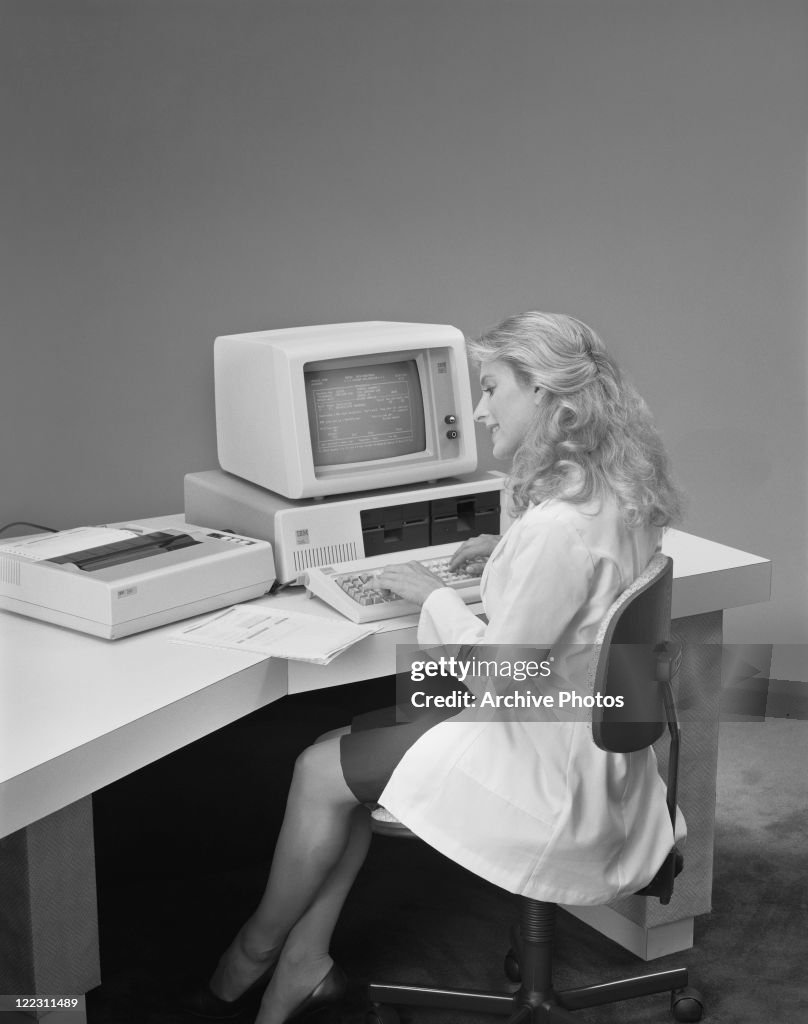 Businesswoman working at computer in office