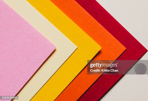 warm tone colored paper abstract background - paper craft stock-fotos und bilder