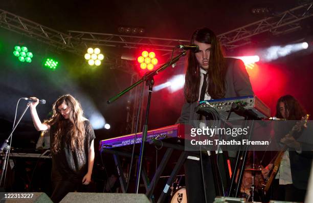 Madeline Follin and Brian Oblivion of Cults perform on the Festival Republic Stage during day two of Reading Festival at Richfield Avenue on August...