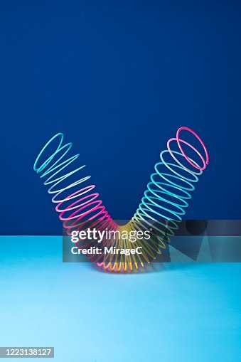 Stretched Coil Spring Toy High-Res Stock Photo - Getty Images