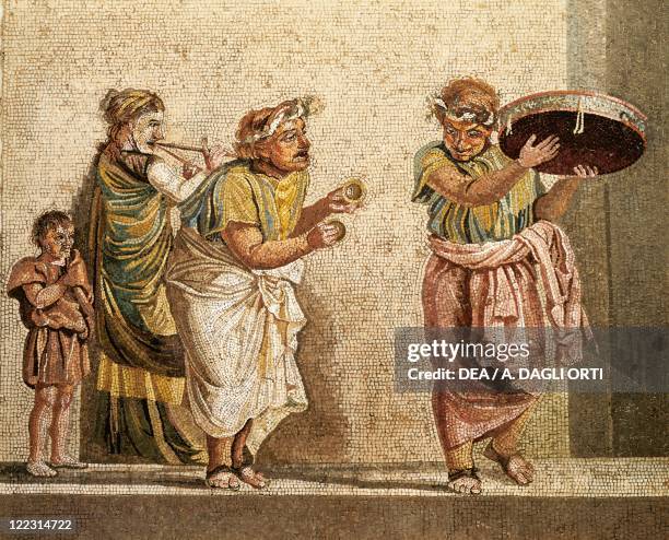 Roman civilization, 2nd century b.C. Mosaic depicting a group of street musicians. From the Villa of Cicero, Pompei, Campania Region, Italy.