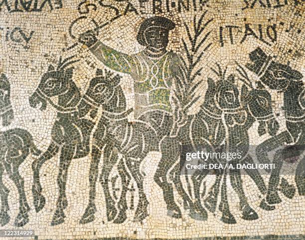 Roman civilization, 4th century. Mosaic depicting a quadriga during chariot racing in a circus.