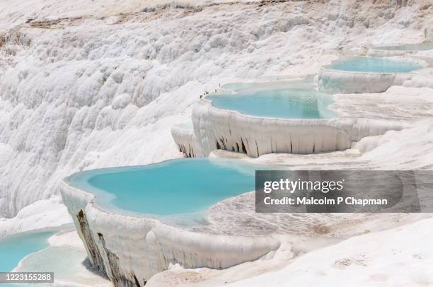 turquoise pools in travertine terraces at pamukkale, turkey - pamukkale stock pictures, royalty-free photos & images