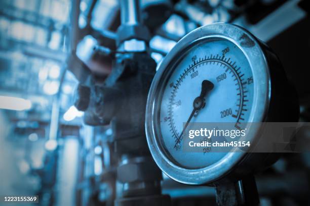 pipeline and pressure gauge on offshore platform in oil and gas industry - pressure gauge fotografías e imágenes de stock