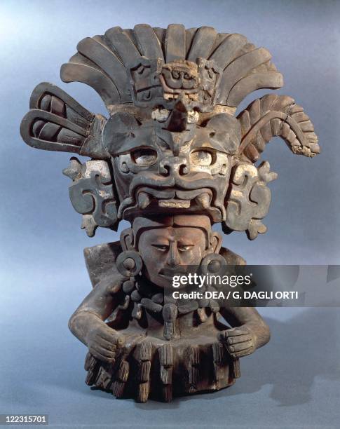 Zapotec civilization, Mexico. Polychrome ceramic funerary urn representing the god of maize.