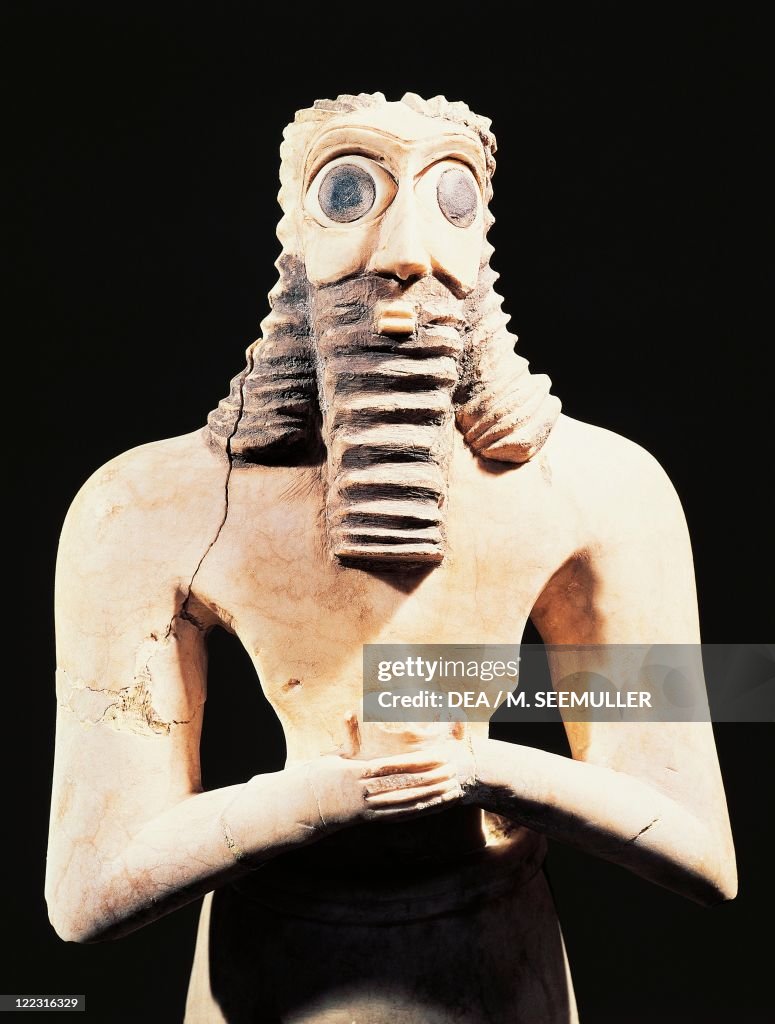 Detail of limestone statuette of praying man, from Tell Asmar, Iraq