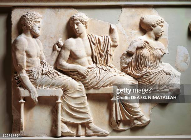 Greek civilization, 5th century b.C. Pentelic marble east frieze of the Parthenon by Phidias. Relief depicting seated Poseidon, Apollo and Artemis,...