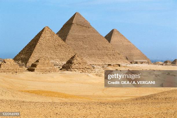 Egypt - Cairo - Ancient Memphis . Pyramids at Giza. Pyramid of Khafre , Menkaure and Khufu .