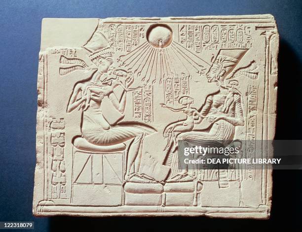 Egyptian civilization, New Kingdom, Dynasty XVIII. Relief depicting King Amenhotep IV , his wife Nefertiti and their children under the rays of the...