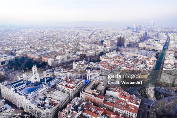 spain, madrid, helicopter view of puerta de alcala triumphal arch and surrounding buildings - madrid aerial stock pictures, royalty-free photos & images