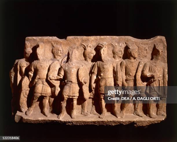 Roman civilization. Relief depicting legionaries wearing regulation armor. From Cumae, Campania region, Italy.